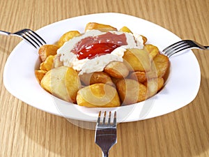 Patatas Bravas Ã¢â¬â Hot spicy fried potatoes photo